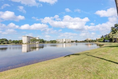 Discover this beautiful & rare VILLA nestled on a QUIET on Palm-Aire Country Club and Resort - Palms in Florida - for sale on GolfHomes.com, golf home, golf lot