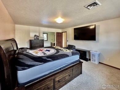 Step into resort-style living with this stunning 5 bedroom, 4 on Highland Hills Golf Course in Colorado - for sale on GolfHomes.com, golf home, golf lot