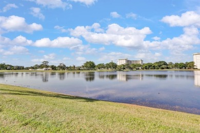 Discover this beautiful & rare VILLA nestled on a QUIET on Palm-Aire Country Club and Resort - Palms in Florida - for sale on GolfHomes.com, golf home, golf lot