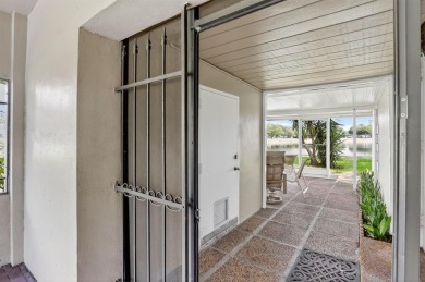 Discover this beautiful & rare VILLA nestled on a QUIET on Palm-Aire Country Club and Resort - Palms in Florida - for sale on GolfHomes.com, golf home, golf lot