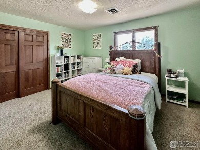 Step into resort-style living with this stunning 5 bedroom, 4 on Highland Hills Golf Course in Colorado - for sale on GolfHomes.com, golf home, golf lot