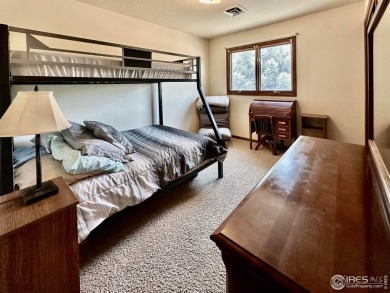 Step into resort-style living with this stunning 5 bedroom, 4 on Highland Hills Golf Course in Colorado - for sale on GolfHomes.com, golf home, golf lot