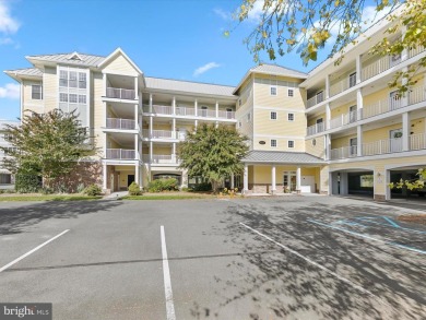 Gorgeous Peninsula two-bedroom top-floor condominium showcasing on The Peninsula Golf and Country Club in Delaware - for sale on GolfHomes.com, golf home, golf lot