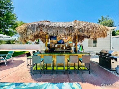 Step into resort-style living with this stunning 5 bedroom, 4 on Highland Hills Golf Course in Colorado - for sale on GolfHomes.com, golf home, golf lot