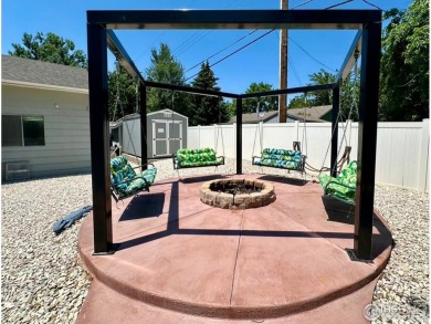 Step into resort-style living with this stunning 5 bedroom, 4 on Highland Hills Golf Course in Colorado - for sale on GolfHomes.com, golf home, golf lot