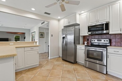 Discover this beautiful & rare VILLA nestled on a QUIET on Palm-Aire Country Club and Resort - Palms in Florida - for sale on GolfHomes.com, golf home, golf lot