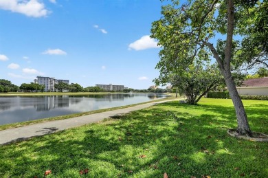 Discover this beautiful & rare VILLA nestled on a QUIET on Palm-Aire Country Club and Resort - Palms in Florida - for sale on GolfHomes.com, golf home, golf lot