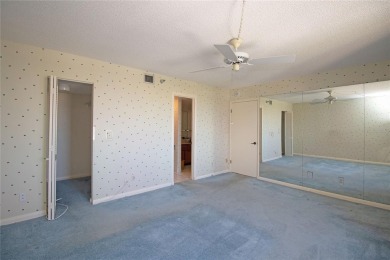 Elevate your lifestyle with luxury living in the sought after on Pasadena Yacht and Country Club in Florida - for sale on GolfHomes.com, golf home, golf lot