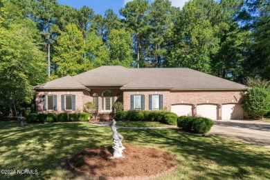 Stunning, custom-built all-brick home on a private 1-acre corner on Cypress Landing Golf Club in North Carolina - for sale on GolfHomes.com, golf home, golf lot