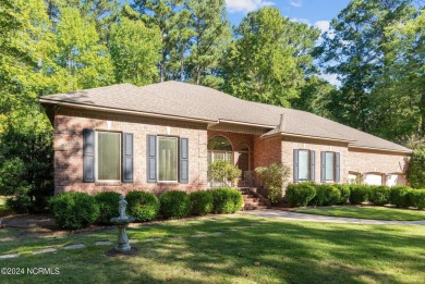 Stunning, custom-built all-brick home on a private 1-acre corner on Cypress Landing Golf Club in North Carolina - for sale on GolfHomes.com, golf home, golf lot