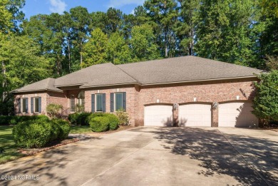 Stunning, custom-built all-brick home on a private 1-acre corner on Cypress Landing Golf Club in North Carolina - for sale on GolfHomes.com, golf home, golf lot