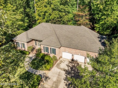 Stunning, custom-built all-brick home on a private 1-acre corner on Cypress Landing Golf Club in North Carolina - for sale on GolfHomes.com, golf home, golf lot