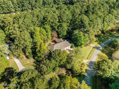 Stunning, custom-built all-brick home on a private 1-acre corner on Cypress Landing Golf Club in North Carolina - for sale on GolfHomes.com, golf home, golf lot