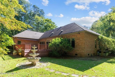 Stunning, custom-built all-brick home on a private 1-acre corner on Cypress Landing Golf Club in North Carolina - for sale on GolfHomes.com, golf home, golf lot