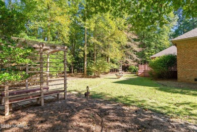 Stunning, custom-built all-brick home on a private 1-acre corner on Cypress Landing Golf Club in North Carolina - for sale on GolfHomes.com, golf home, golf lot