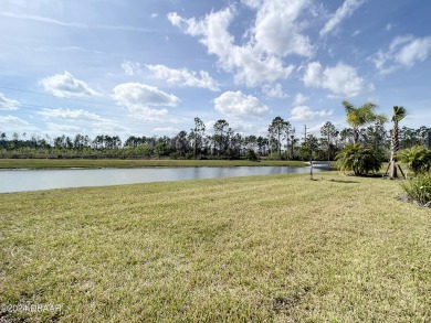 Your Patch of Paradise awaits you in this spacious 3 Bedroom 2 on LPGA International Golf Course in Florida - for sale on GolfHomes.com, golf home, golf lot