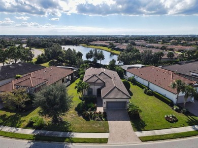 Welcome to 5242 Napoli Run, an exceptional residence located in on Esplanade Golf and Country at Lakewood Ranch in Florida - for sale on GolfHomes.com, golf home, golf lot