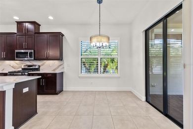 Welcome to 5242 Napoli Run, an exceptional residence located in on Esplanade Golf and Country at Lakewood Ranch in Florida - for sale on GolfHomes.com, golf home, golf lot