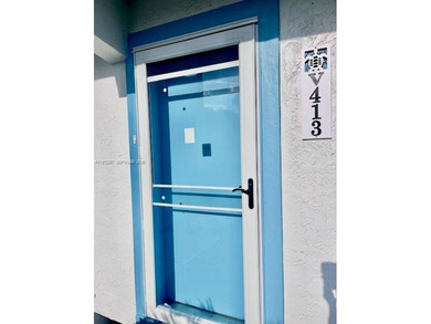 Beautiful corner unit1 bedroom 1 bath, first floor.  concrete on Ocean Village Golf Course in Florida - for sale on GolfHomes.com, golf home, golf lot