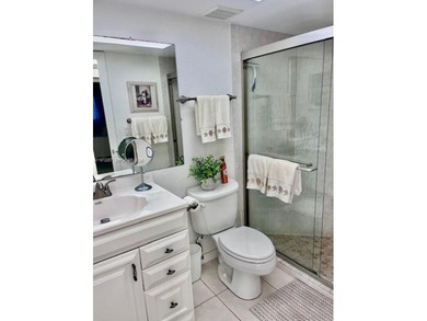 Beautiful corner unit1 bedroom 1 bath, first floor.  concrete on Ocean Village Golf Course in Florida - for sale on GolfHomes.com, golf home, golf lot