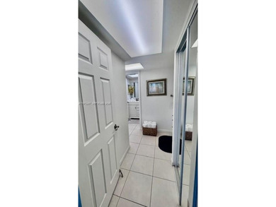 Beautiful corner unit1 bedroom 1 bath, first floor.  concrete on Ocean Village Golf Course in Florida - for sale on GolfHomes.com, golf home, golf lot