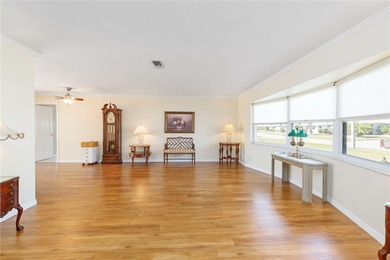 Experience quintessential Florida living in this spacious on Village Green Golf Club of Sarasota in Florida - for sale on GolfHomes.com, golf home, golf lot