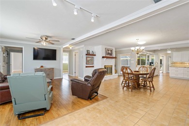 Experience quintessential Florida living in this spacious on Village Green Golf Club of Sarasota in Florida - for sale on GolfHomes.com, golf home, golf lot