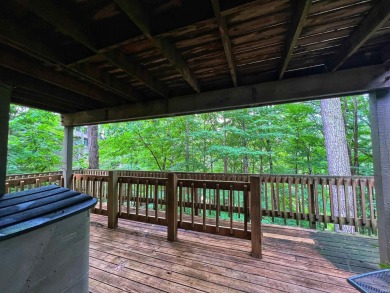 Unique End-Unit Floor Plan with Scenic Wooded Views of Lake on The Eagle Pointe Golf Resort in Indiana - for sale on GolfHomes.com, golf home, golf lot