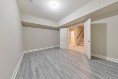 Nestled on 1.67 acres in The Overlook at Marietta Country Club on Marietta Country Club in Georgia - for sale on GolfHomes.com, golf home, golf lot