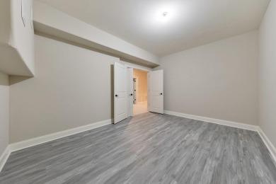 Nestled on 1.67 acres in The Overlook at Marietta Country Club on Marietta Country Club in Georgia - for sale on GolfHomes.com, golf home, golf lot