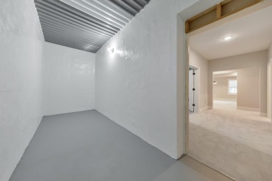 Nestled on 1.67 acres in The Overlook at Marietta Country Club on Marietta Country Club in Georgia - for sale on GolfHomes.com, golf home, golf lot