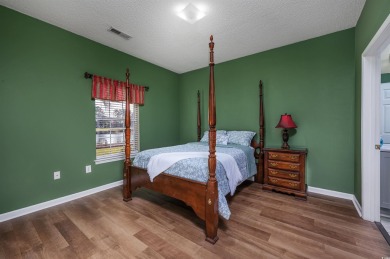 1st-floor end unit, 2-bedroom 2-bathroom cozy condo with on Palmetto Greens Golf and Country Club in South Carolina - for sale on GolfHomes.com, golf home, golf lot