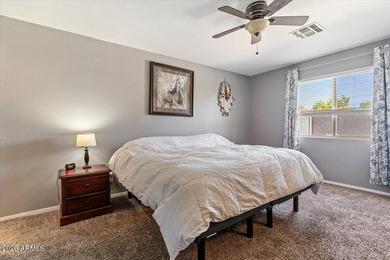 Beat the Arizona heat in this beautifully maintained pool home! on The Golf Club At Johnson Ranch in Arizona - for sale on GolfHomes.com, golf home, golf lot