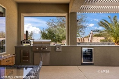 Enjoy luxurious 55+ living in this impeccably maintained 3 bed on Conestoga Golf Club in Nevada - for sale on GolfHomes.com, golf home, golf lot