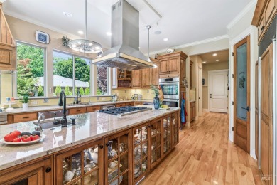 A beautiful French Normandy style former Parade Home that backs on BanBury Golf Club in Idaho - for sale on GolfHomes.com, golf home, golf lot