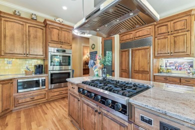 A beautiful French Normandy style former Parade Home that backs on BanBury Golf Club in Idaho - for sale on GolfHomes.com, golf home, golf lot