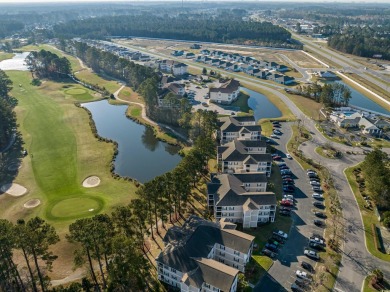 1st-floor end unit, 2-bedroom 2-bathroom cozy condo with on Palmetto Greens Golf and Country Club in South Carolina - for sale on GolfHomes.com, golf home, golf lot