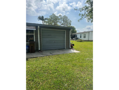 Your Private Oasis Awaits: Stunning Corner Lot 2-Bedroom on Schalamar Creek Golf and Country Club in Florida - for sale on GolfHomes.com, golf home, golf lot