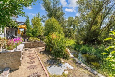 A beautiful French Normandy style former Parade Home that backs on BanBury Golf Club in Idaho - for sale on GolfHomes.com, golf home, golf lot