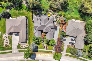 A beautiful French Normandy style former Parade Home that backs on BanBury Golf Club in Idaho - for sale on GolfHomes.com, golf home, golf lot