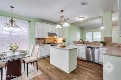Welcome to this gorgeous 4-bedroom, 2.5-bath corner-lot home in on Stewart Peninsula Golf Course in Texas - for sale on GolfHomes.com, golf home, golf lot