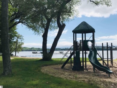 This parcel soaks up the views from hole #18 at the renowned on Shanty Creek Golf Course in Michigan - for sale on GolfHomes.com, golf home, golf lot