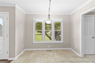 Welcome to this beautiful two-story, 4-bedroom, 2.5-bath home on Baywood Golf Club in North Carolina - for sale on GolfHomes.com, golf home, golf lot