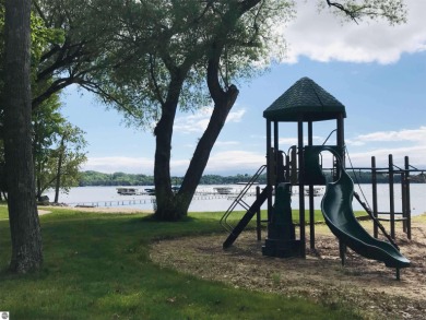 This parcel soaks up the views from hole #18 at the renowned on Shanty Creek Golf Course in Michigan - for sale on GolfHomes.com, golf home, golf lot