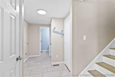 Welcome to this beautiful two-story, 4-bedroom, 2.5-bath home on Baywood Golf Club in North Carolina - for sale on GolfHomes.com, golf home, golf lot