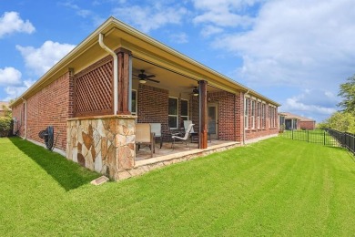 Welcome to your tranquil haven nestled within Frisco Lakes on Frisco Lakes Golf Course in Texas - for sale on GolfHomes.com, golf home, golf lot