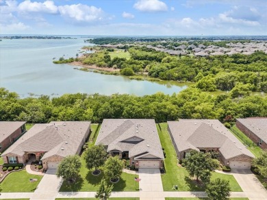 Welcome to your tranquil haven nestled within Frisco Lakes on Frisco Lakes Golf Course in Texas - for sale on GolfHomes.com, golf home, golf lot