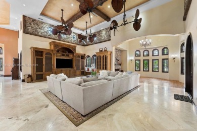One-of-a-kind 6BD/5BA/2HB Mediterranean Redland Estate on 10 on Redland Golf and Country Club in Florida - for sale on GolfHomes.com, golf home, golf lot