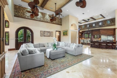 One-of-a-kind 6BD/5BA/2HB Mediterranean Redland Estate on 10 on Redland Golf and Country Club in Florida - for sale on GolfHomes.com, golf home, golf lot