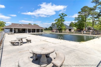 Welcome to this beautiful two-story, 4-bedroom, 2.5-bath home on Baywood Golf Club in North Carolina - for sale on GolfHomes.com, golf home, golf lot